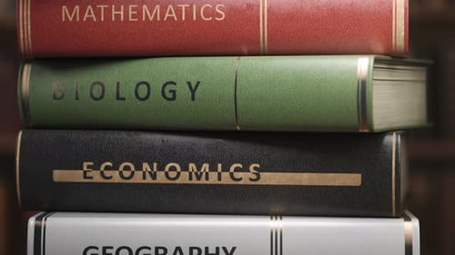 Stack of Educational Books and Textbooks Representing Academic Disciplines and Subjects
