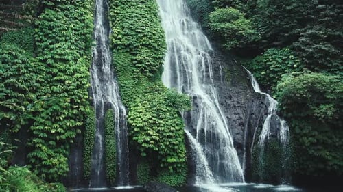 View on Water of Mountain Waterfall Falling in Green Nature of Forest Landscape