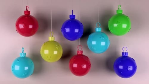 Colorful Christmas Ornaments Swaying on Strings