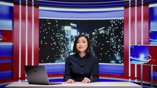 Woman Presenting News in a Modern Studio
