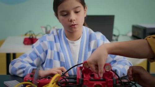 Kids Engineering a Robotic Device at School