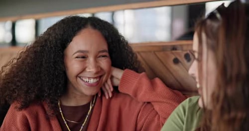 Women friends, chat and listening in coffee shop with support, care and bonding with smile