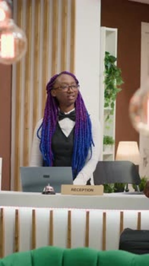 Vertical Video Hotel Concierge Greeting Tourists