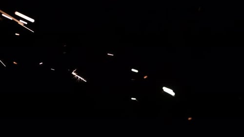 Abstract White and Yellow Particles on Black Background