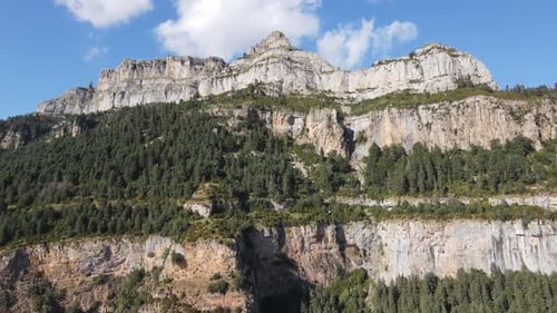Aerial views of a mountain range with a Valley in the Spanish Pyrenees, near Huesca