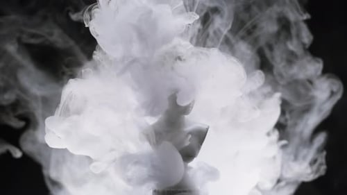 White Statue Sculpture on Black Background in Smoke Smoking Fog Vapour Texture Closeup