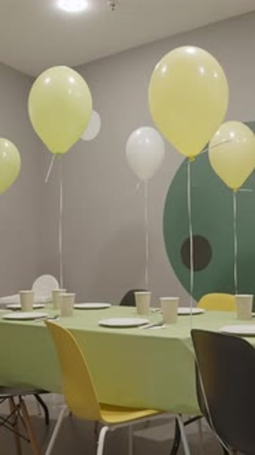 Festive Birthday Party Table Setting with Balloons