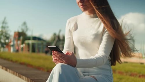 Woman Using Smartphone Outdoor Young Female Student Texting at Phone Walking in Street Communicating
