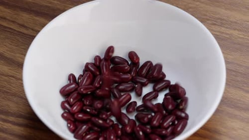 Red Kidney Beans Poured Into White Bowl