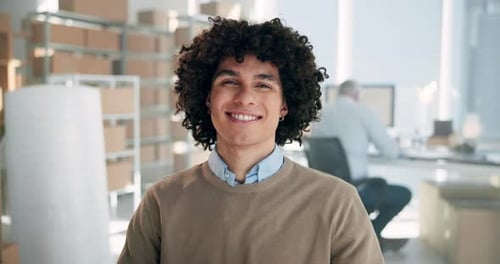 Smiling Young Man in Bright Office Environment