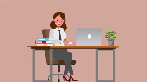 Female Office Worker Working On Computer In Office