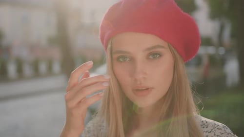Blond Attractive Young Caucasian Lady Wearing Red Beret and Smiling on Sunny Street Beautiful Woman