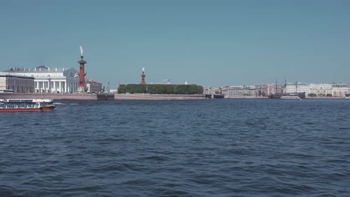 Boats On the River in the City and Torches on Columns
