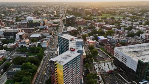 An aerial view of a city with tall buildings