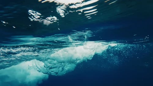 Underwater View of the Ocean Wave Breaking Over the Shore in the Maldives