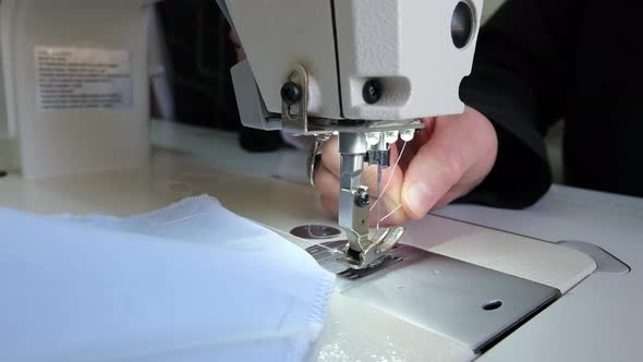 tailor threading a sewing machine, Business, Corporate Stock Footage ft ...