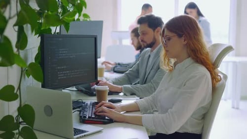 Group of the IT Technicians Working on Artificial Intelligence at Office