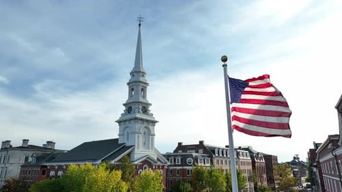Historic American Church and Waving Flag Aerial View
