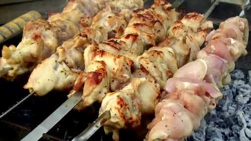 Chicken Kabobs on Grill Cooking Over Hot Coals