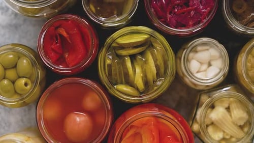 Cucumber Pepper Tomatoes Mushrooms Pickling and Canning Into Glass Jars