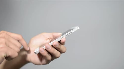 Close up of Hand Using Phone