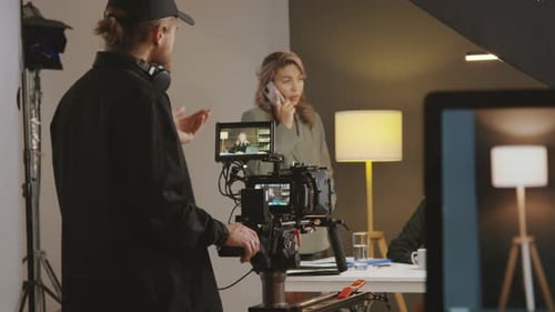 Production Crew Preparing for Filming in Studio