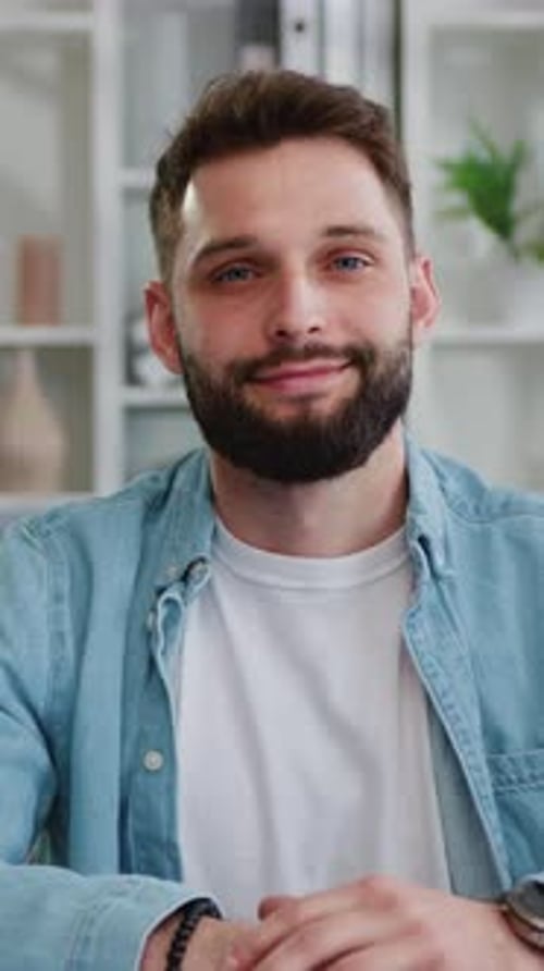 Smiling Man Looking Directly At the Camera