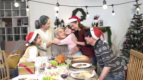 Happy Family Christmas Celebration with Hugs