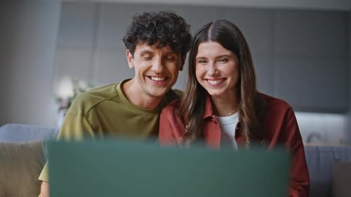 Happy Couple Video Calling at Home