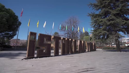 City Park with Large Letters and Flags