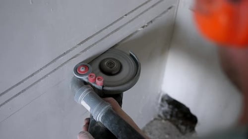 Creating Cable Channels with an Angle Grinder Cutting Wall Grooves for Electrical Wiring