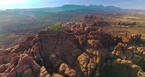 Sunlit canyon mountains in Arches National park in Utah, United States.