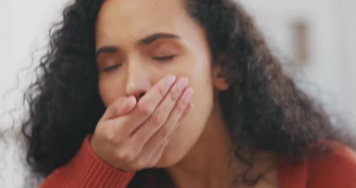 Woman Taking Pills With Water in Home