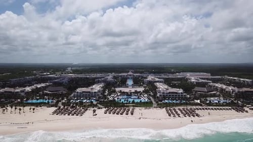 Waves Crashing On White Sand Beach In Cancún