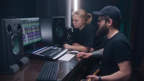 Audio Engineer and Producer Create Song in Recording Room