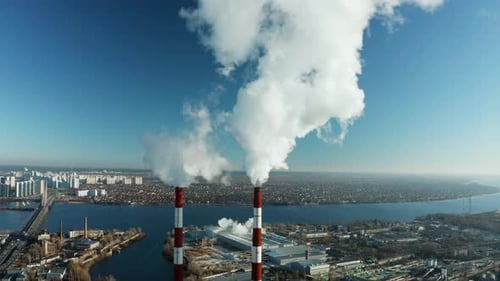 Pollution of the environment: a pipe with smoke. Power Plant.