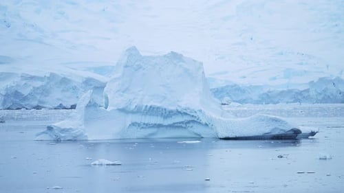 Big Large Iceberg Ice Formations in Sea, Floating in Antarctica Ocean Sea Water in Beautiful Antarct