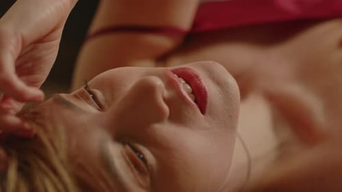 Sensual Woman Relaxing in Soft Light