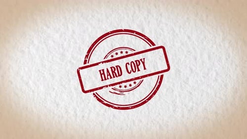 Hand Stamping Red Hard Copy Stamp on Paper