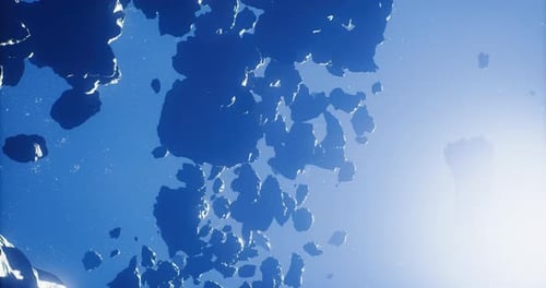 Stunning View of Rocky Asteroids Floating in the Deep Blue Space Environment