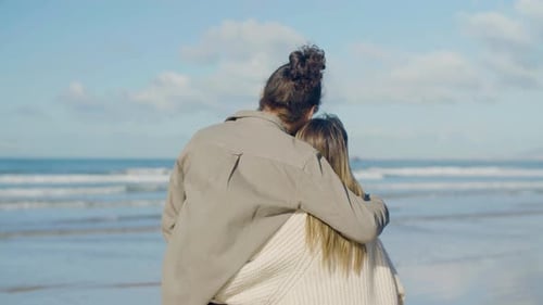 Romantic Caucasian Couple Spending Time at Beach