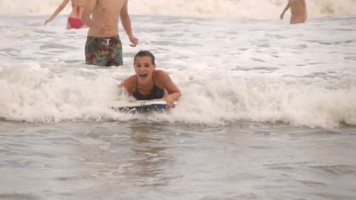 Woman Surfing On Board In Sea, Super Slow Motion 240fps