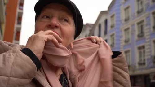 Portrait of an Elderly Woman Untying a Scarf Around Her Neck Grandma Walking on the Street