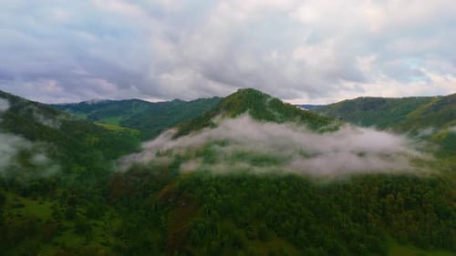 Aerial View of Green Mountains with Clouds