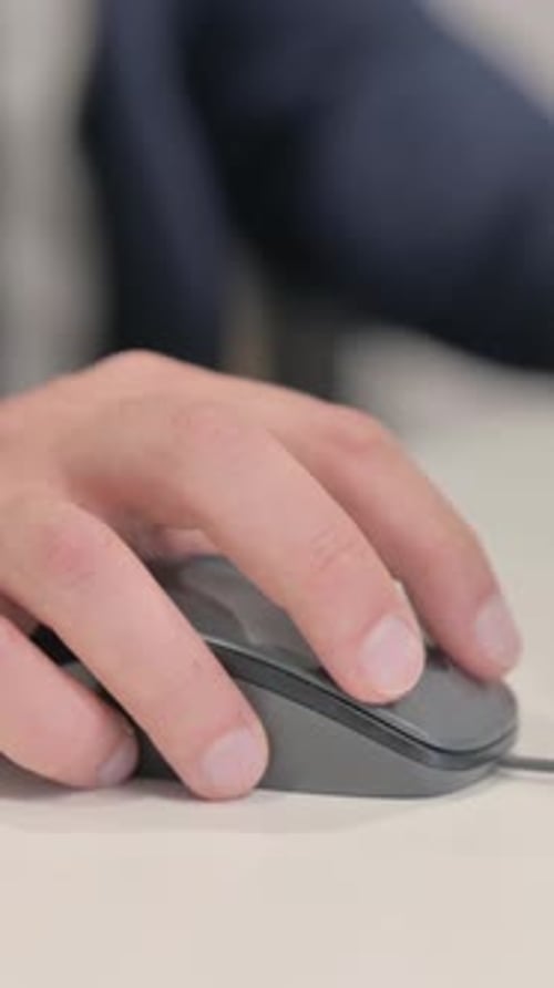 Close up of Businessman Using Computer Mouse, vertical video