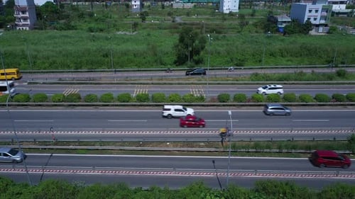 Freeway,Highway or Motorway with traffic on sunny clear day with all types of motor vehicles. Drone