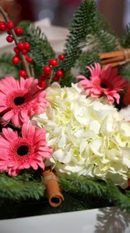 Festive Floral Centerpiece with Cinnamon Sticks and Berries