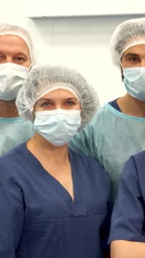 Dedicated Surgical Team Poised for Action in the Operating Room