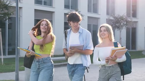 University Students Chatting and Walking on Campus
