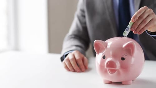 People, Financial Savings, Investing and Economy Concept - Close Up of Businessman